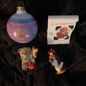 four Hallmark Keepsake ornaments - without box
